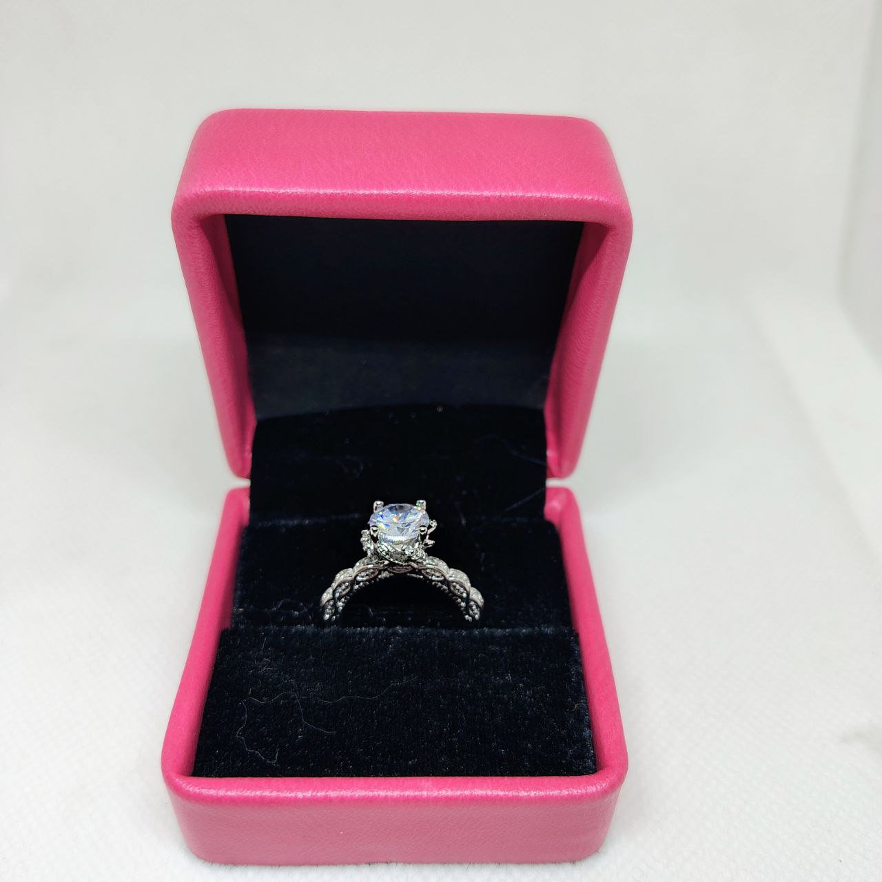 Luminous Embrace Brilliant Center Stone with Twisted Band Womens Ring