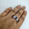 vibrant gold ring adorned with colorful gemstones,
